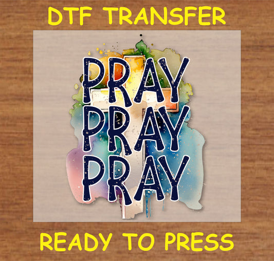 "Pray Pray Pray DTF Transfer featuring a colorful cross design for faith-based projects"