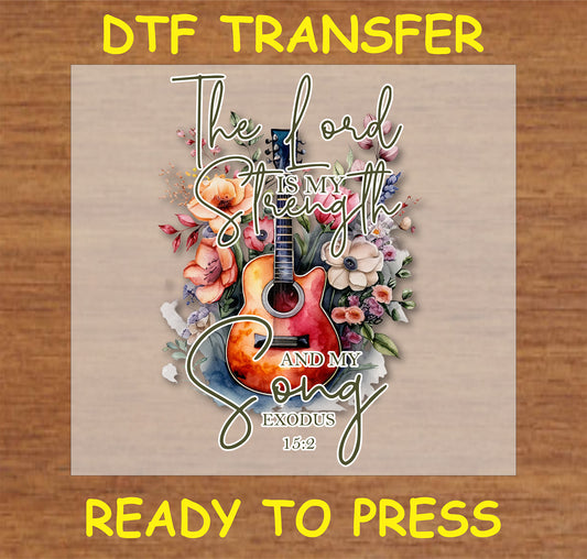 "The Lord Is My Strength and My Song DTF Transfer featuring a guitar and floral design for faith-based projects"