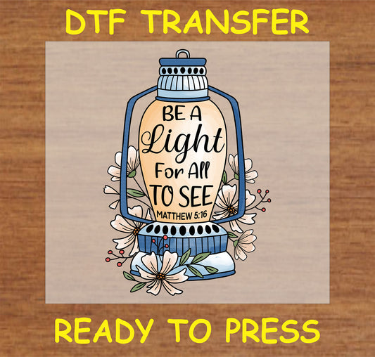 "Be the Light DTF transfer with lantern and floral design"