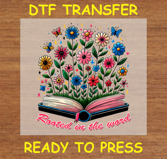 "Rooted in the Word DTF Transfer featuring an open book with flowers and butterflies design."