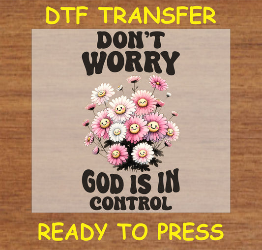 "Don't Worry God is in Control DTF Transfer featuring cheerful flowers and a positive message."