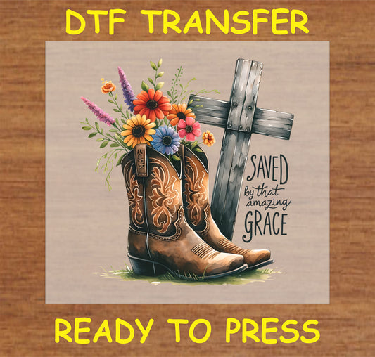 "Saved by that Amazing Grace DTF Transfer featuring cowboy boots, flowers, and a cross design."