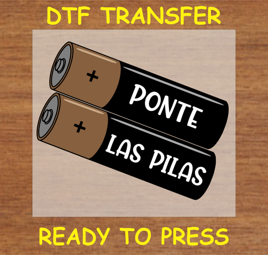 DTF transfer featuring the text 'Ponte Las Pilas' with battery graphics, perfect for custom apparel.