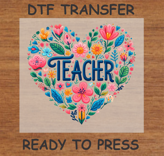 "Beautiful floral 'Teacher' DTF transfer featuring a heart-shaped arrangement of colorful flowers. Perfect for creating custom t-shirts that show appreciation for educators. Ready to press, ideal for personalized teacher gifts."