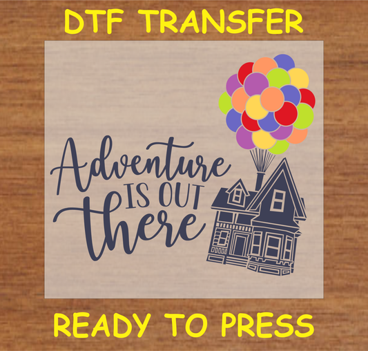 DTF transfer featuring the text 'Adventure is Out There' with a house and colorful balloons, perfect for custom apparel.