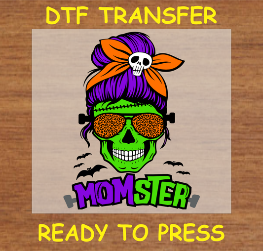 DTF transfer featuring the text 'MOMSTER' with a colorful skull and Halloween elements, perfect for custom apparel.