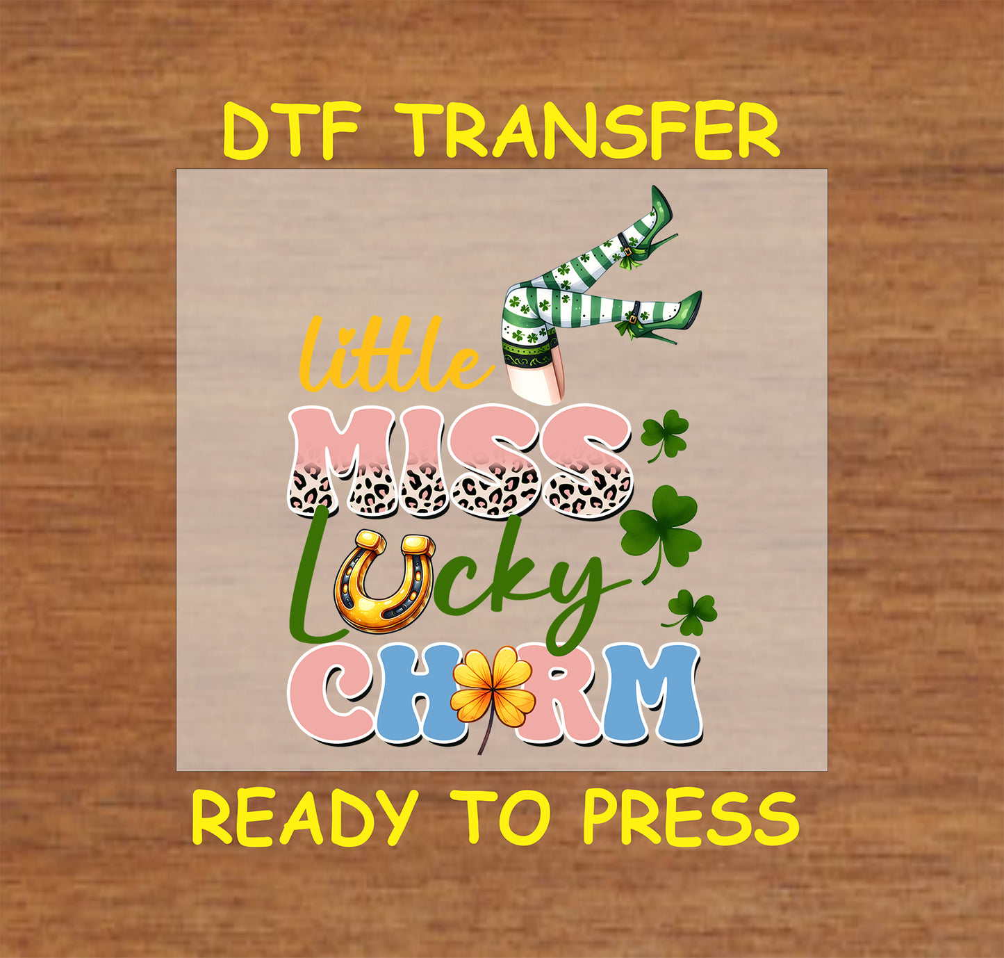 St. Patrick’s DTF transfer with stylish text reading “Lucky Charm” surrounded by shamrocks and festive elements.