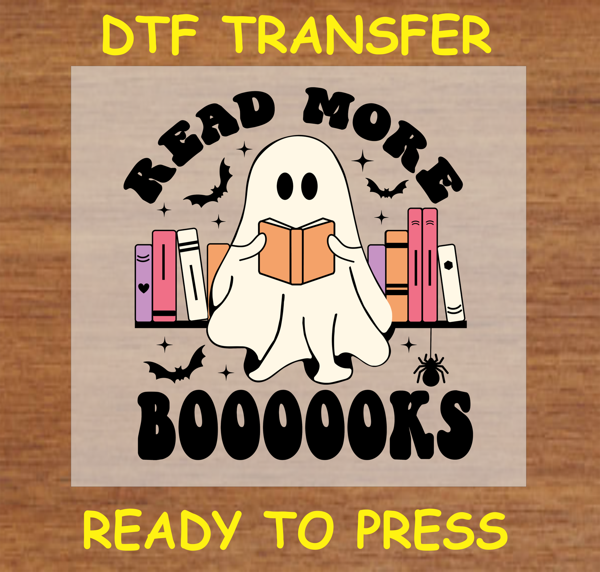 Read More Booooks' DTF Transfer design with a cute ghost holding a book, surrounded by books, bats, and a spider. Ready to press.