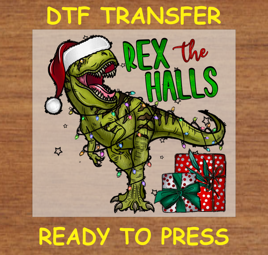 DTF Transfer featuring a festive T-Rex wearing a Santa hat, wrapped in Christmas lights, and the text "Rex the Halls."