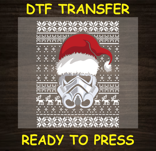 DTF transfer featuring a galactic helmet with a Santa hat in an ugly sweater-style design for custom holiday apparel.