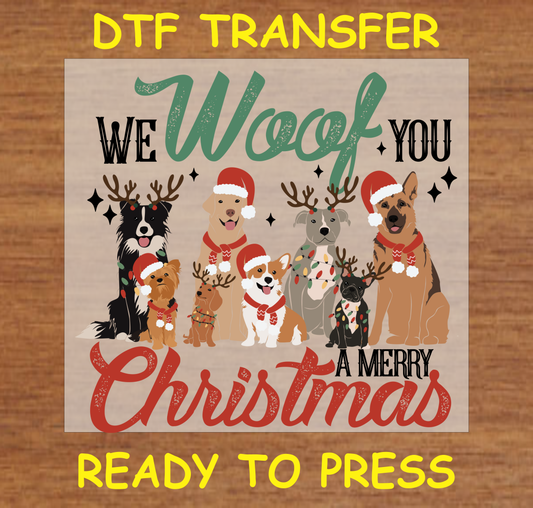 We Woof You A Merry Christmas DTF transfer with festive dogs in holiday gear.