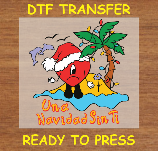 DTF transfer featuring a sad heart in a Santa hat on a beach with a decorated palm tree, along with the text "Una Navidad Sin Ti."