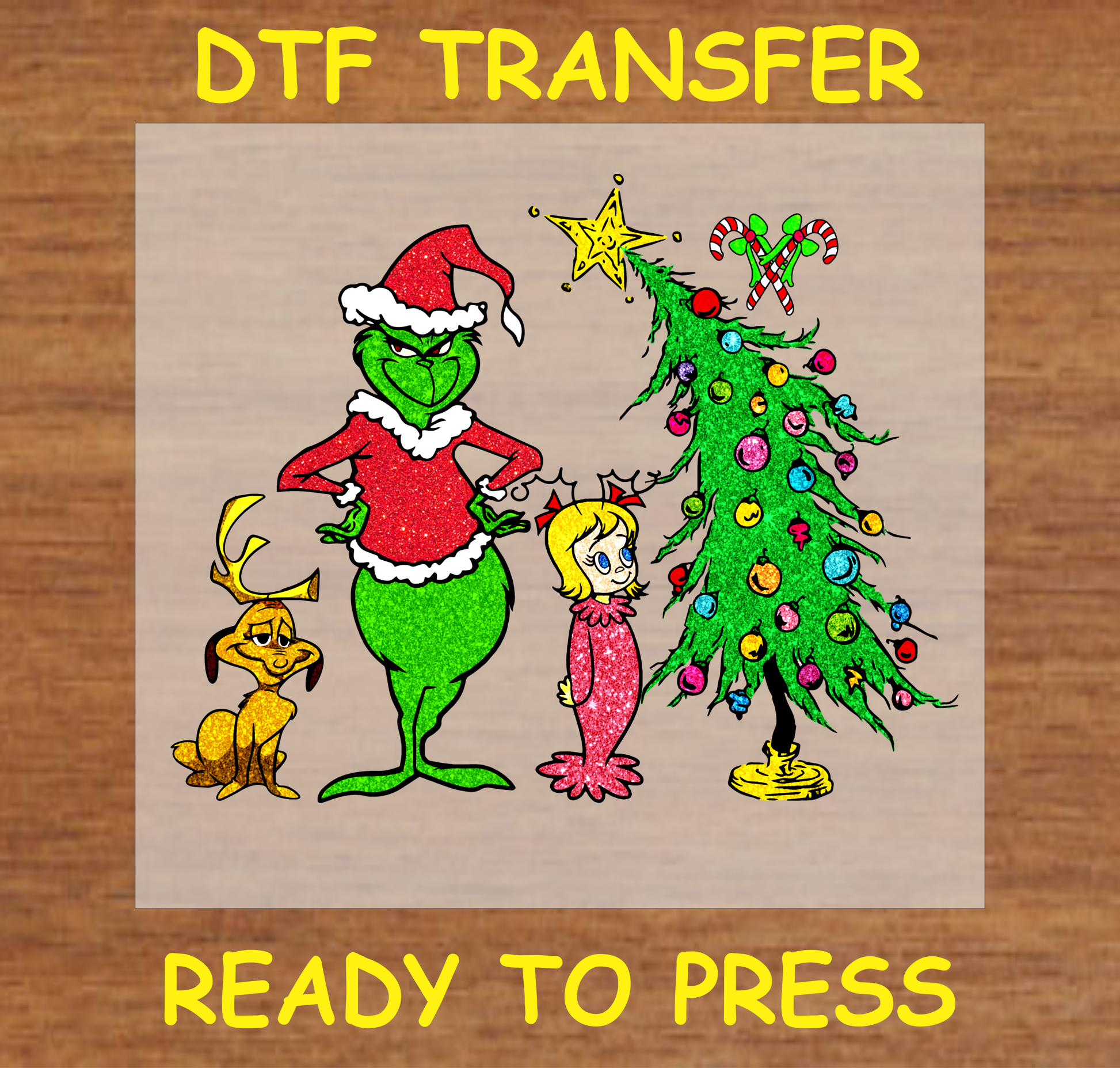 DTF transfer featuring the Grumpy green character, a dog, and a decorated Christmas tree with festive ornaments.