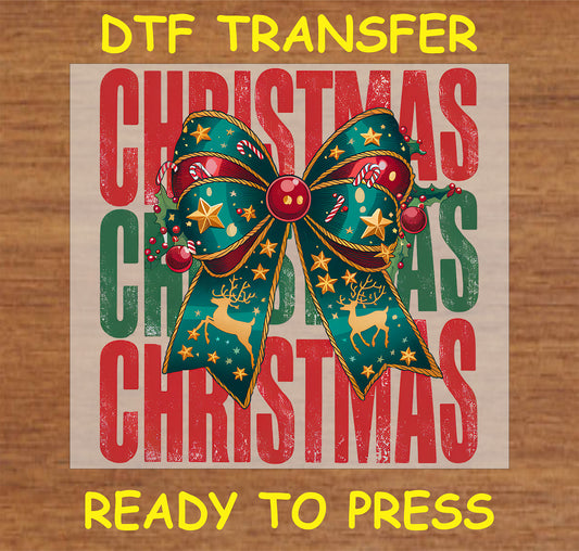 "CHRISTMAS DTF Transfer featuring a decorative bow and festive holiday design"