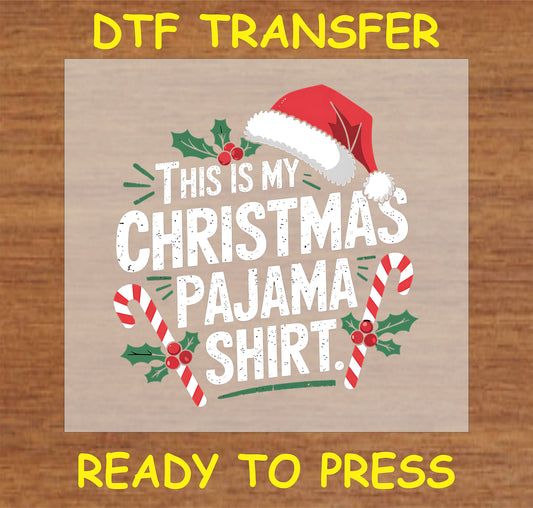 "DTF transfer design that reads 'This is My Christmas Pajama Shirt' with festive graphics and colors"