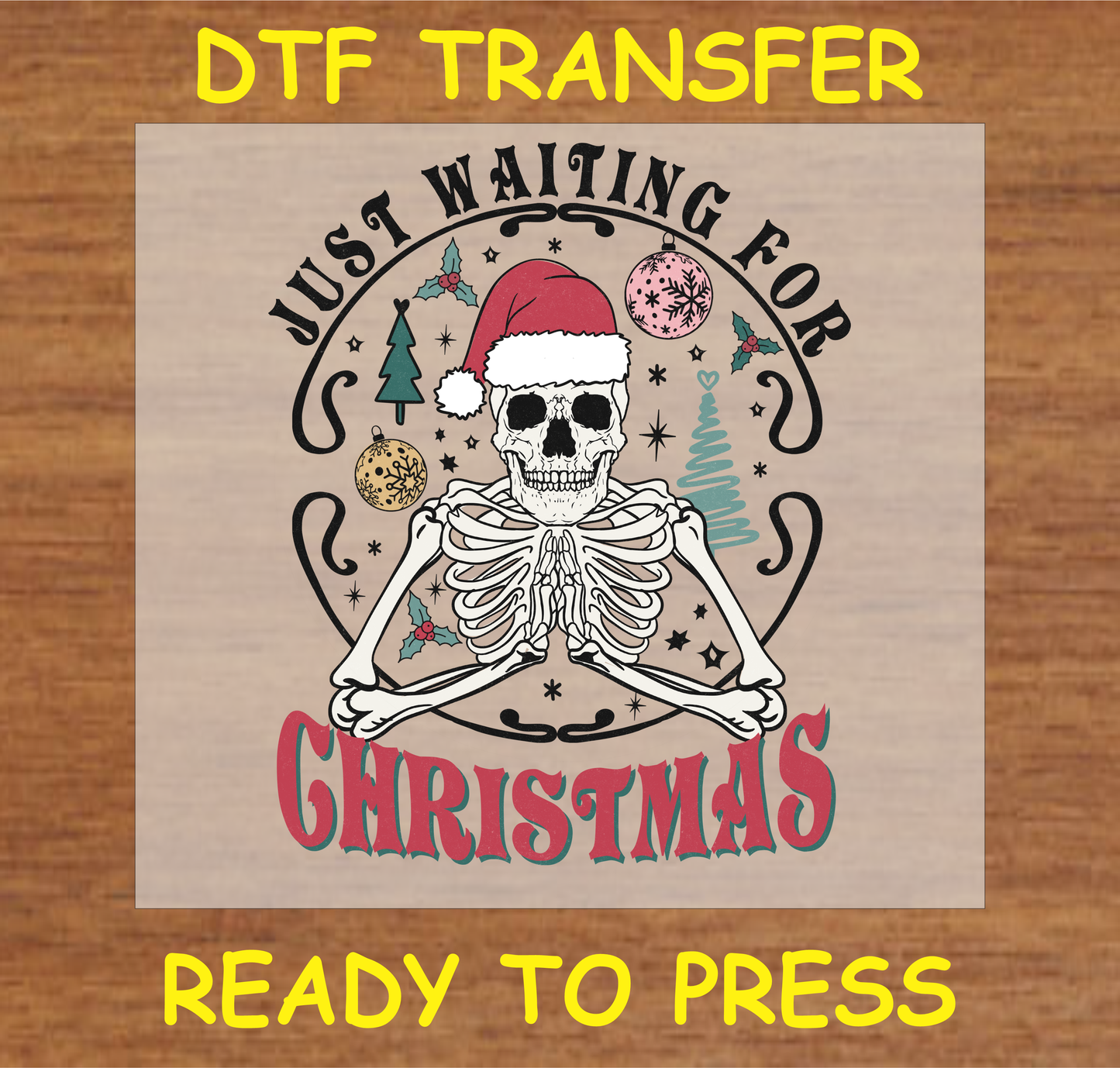 DTF transfer design featuring a skeleton in a Santa hat surrounded by Christmas ornaments with the text "Just Waiting for Christmas."